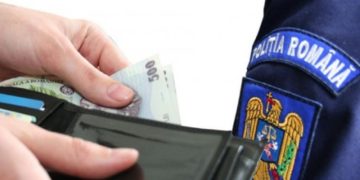 Un polițist din Dâmbovița a fost reținut pentru luare de mită!