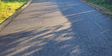 Asfaltările Continuă în Butimanu: Lucrările Avansează în Ritm Sustenabil!